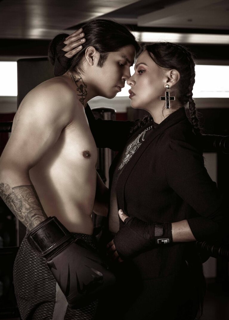 A man and woman face each other in a dramatic encounter in a boxing gym.