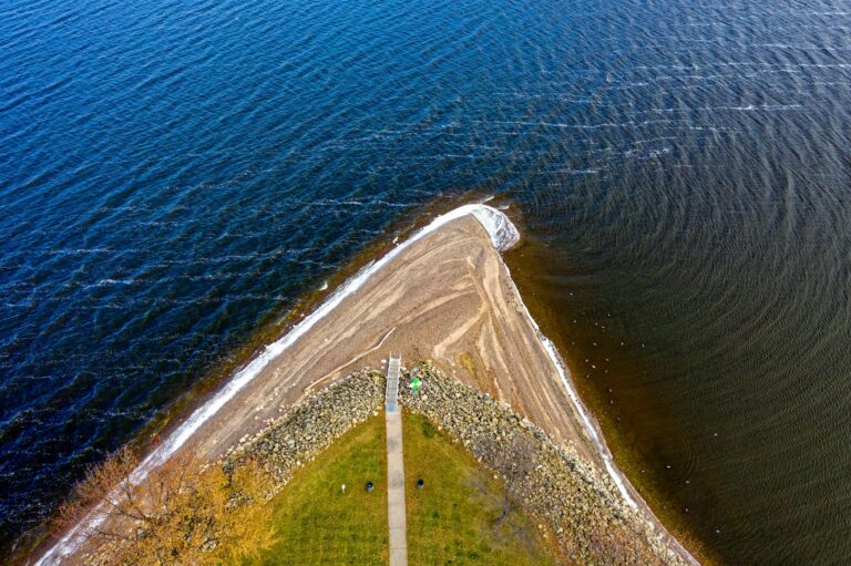 Aerial view capturing a scenic peninsula at a lake in Lake City, Minnesota.