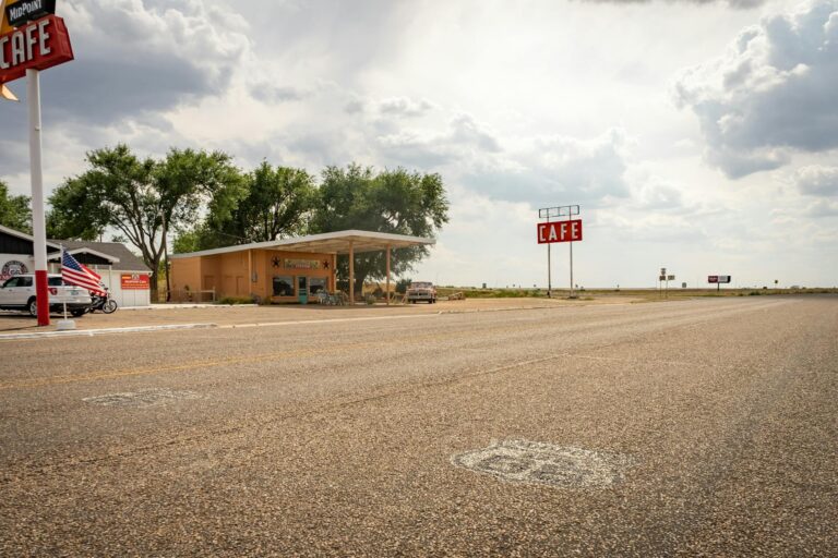 Iconic Midpoint Café on Route 66, featuring retro charm with a vast highway view.