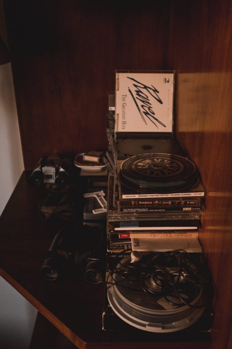 A nostalgic corner shelf filled with vintage audio tapes and equipment, capturing retro vibes.