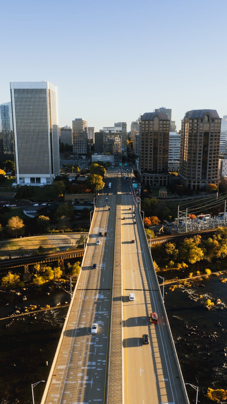 Aerial view of downtown Richmond, Virginia featuring prominent skyscrapers and a river.